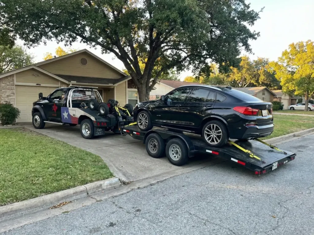 image of a AWD car being towed