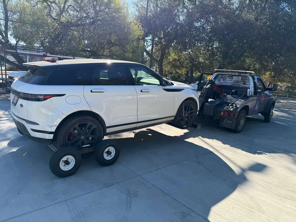 a 4x4 Vehicle being towed by Texas Patriot Towing